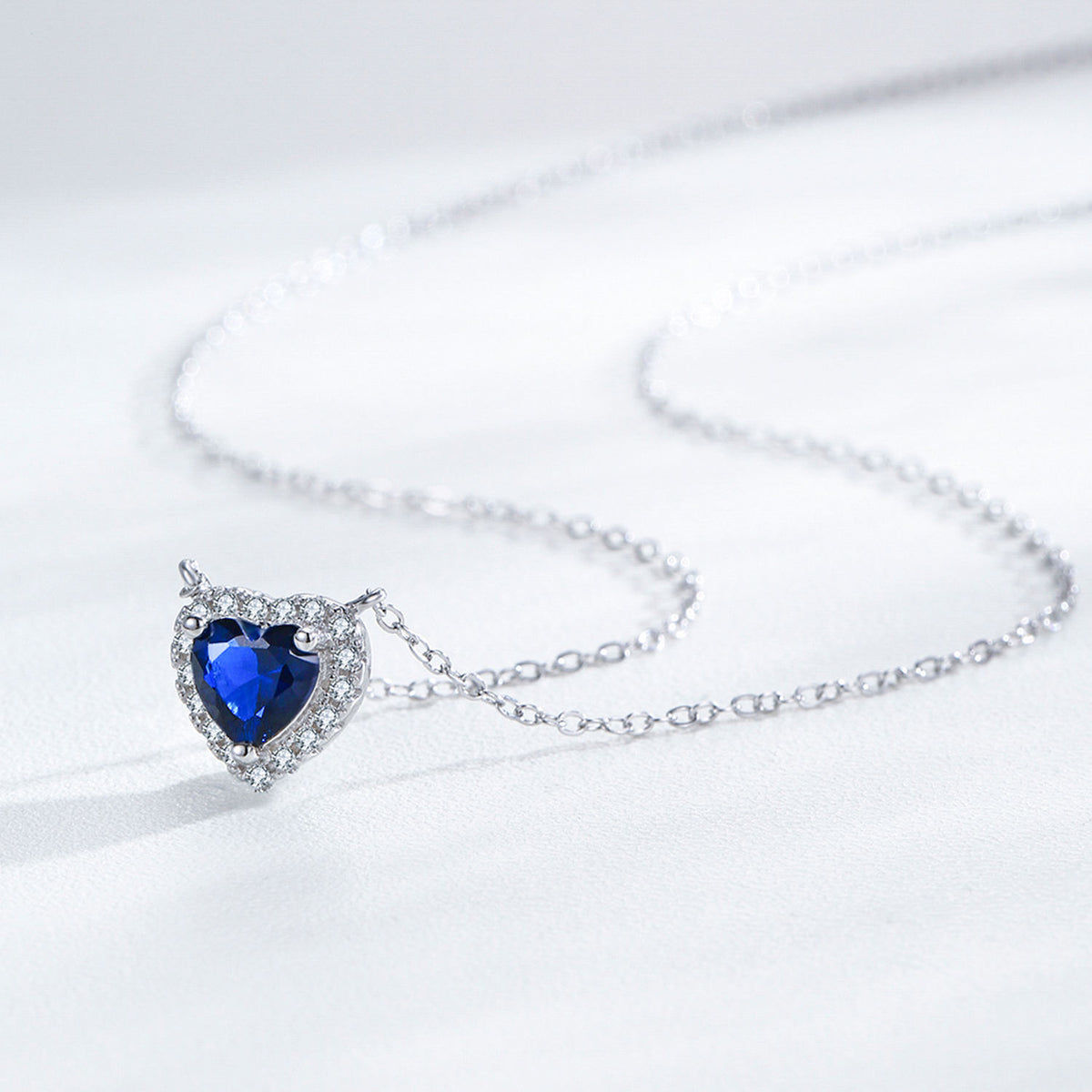 Conjunto de collar y pendientes Corazón Azul de Plata